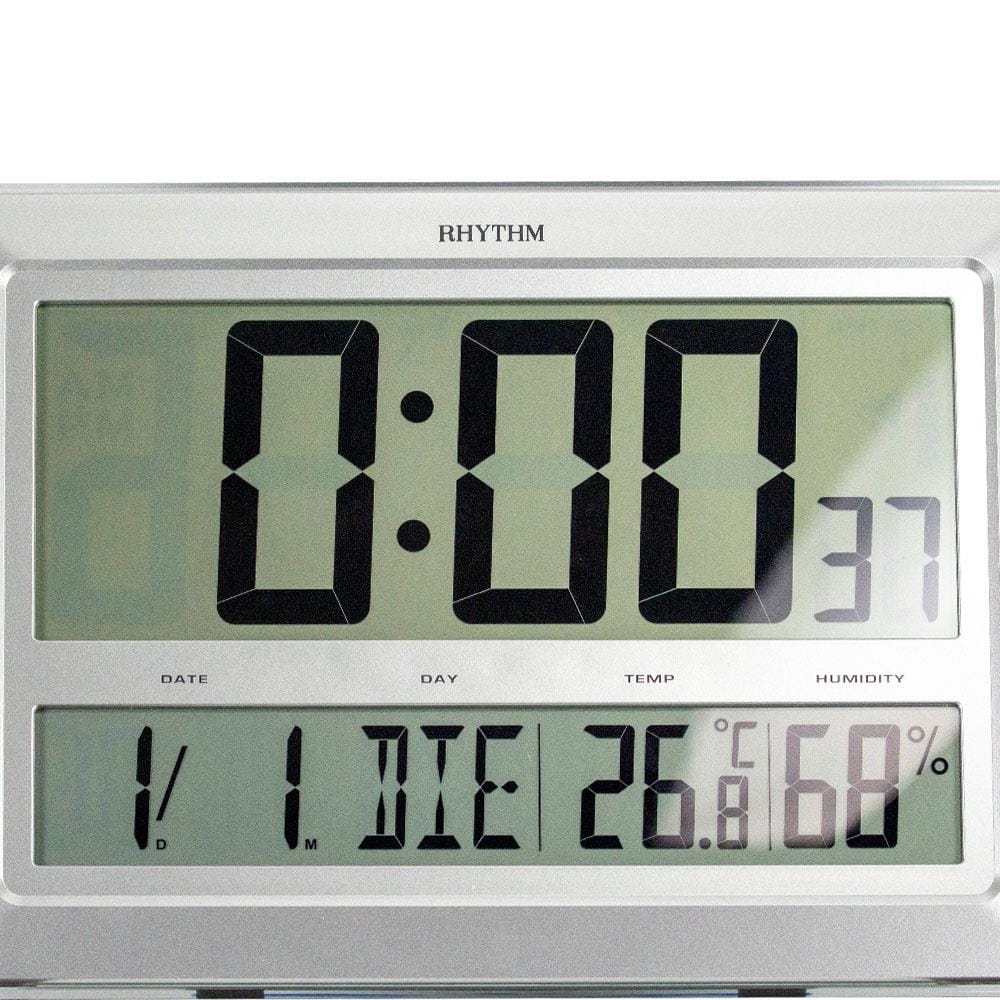 นาฬิกาตั้งโต๊ะพลาสติก RHYTHM LCW015NR19 11.5X15.5 นิ้ว สีขาว